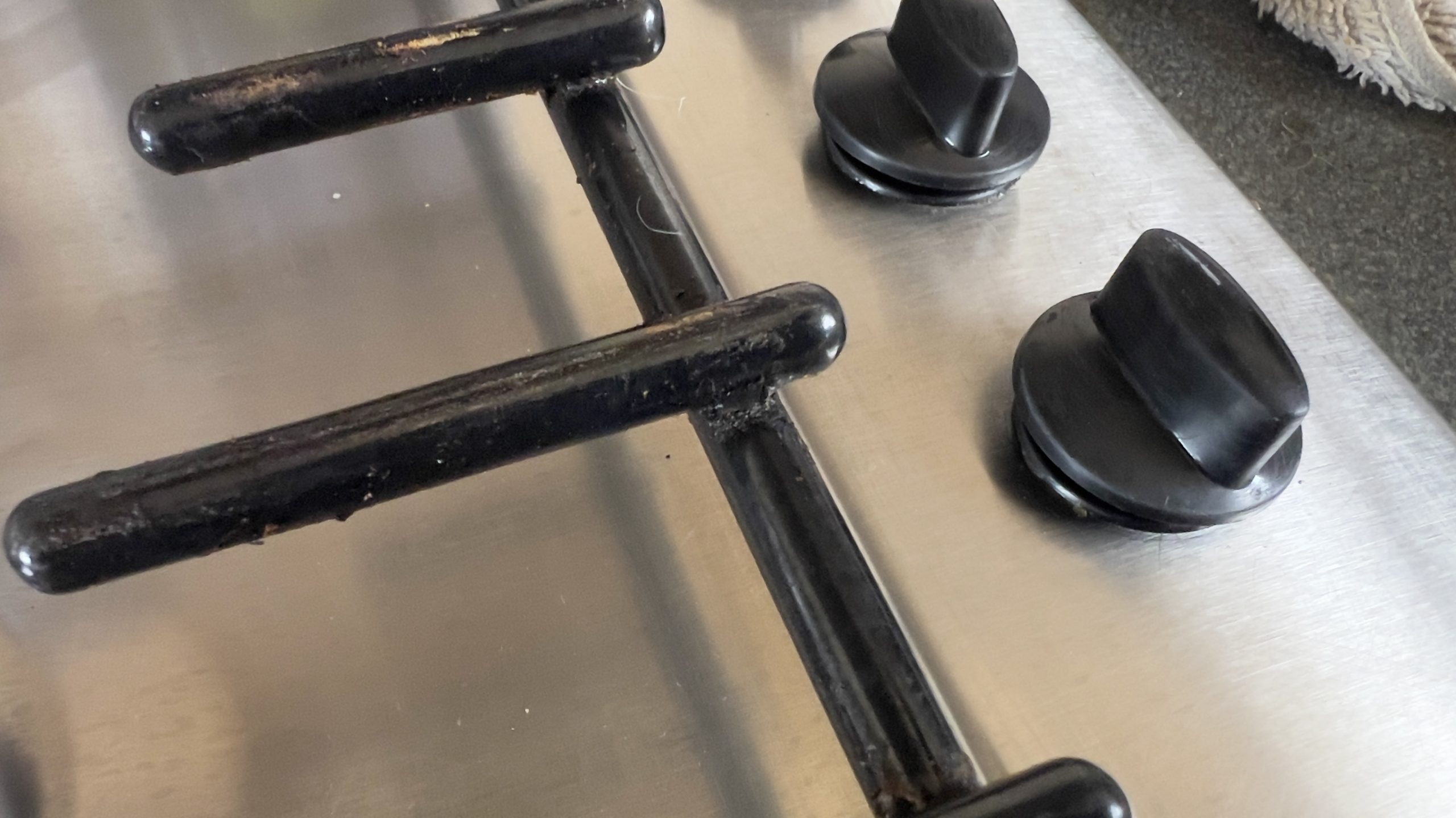removed thick grease on gas hob knobs